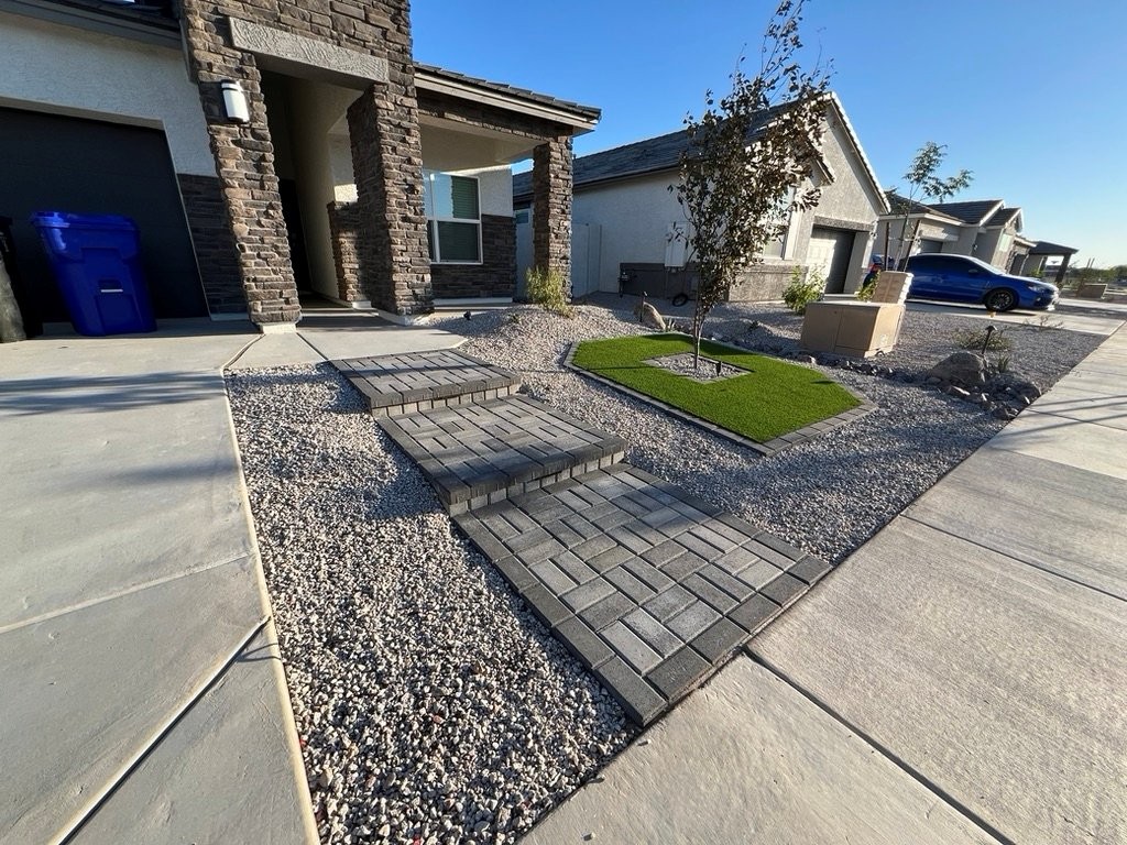 Paver patio and pool deck installation in an Arizona backyard with a running bond pattern